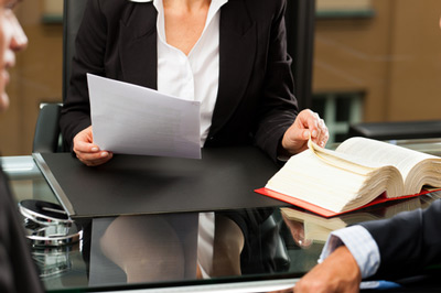 Lawyer looking through book